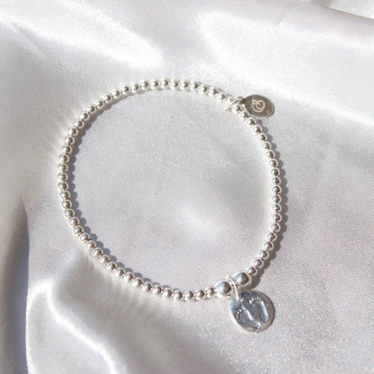 Footprints on Silver Ball Bead Bracelet - MYLEE London