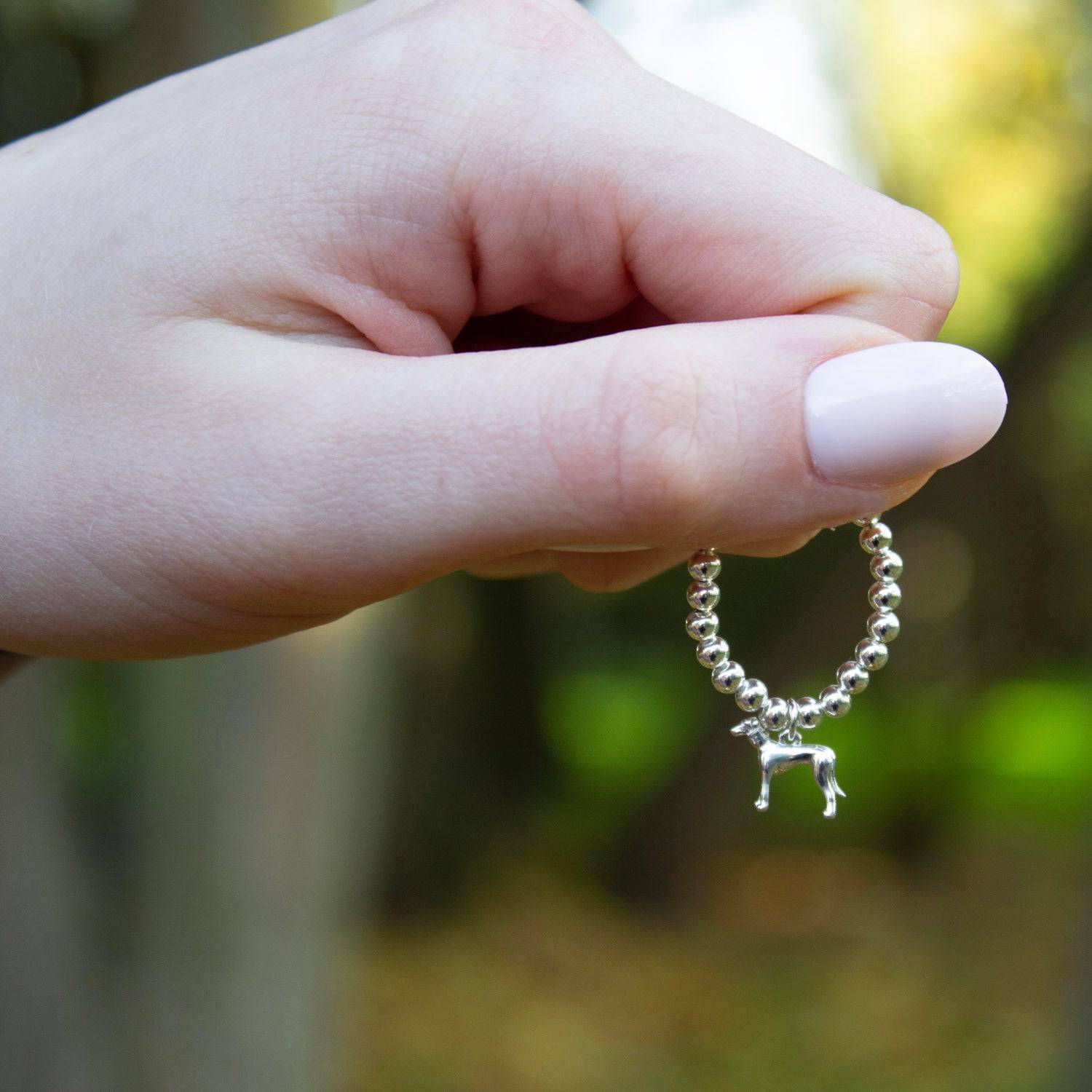 Sterling Silver Ball Bead Ring With Greyhound Charm - MYLEE London